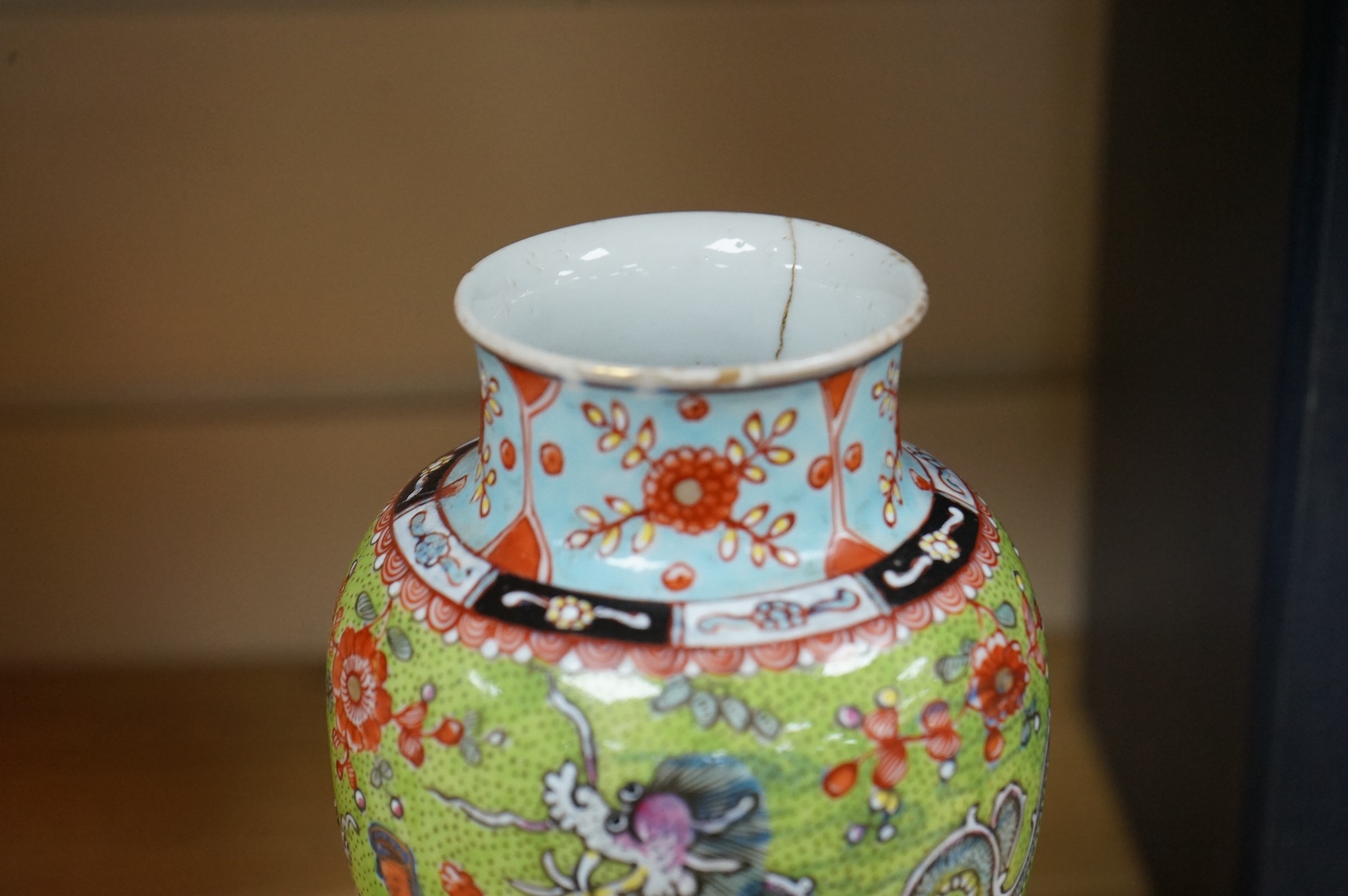 An 18th century Chinese clobbered vase, 20cm high